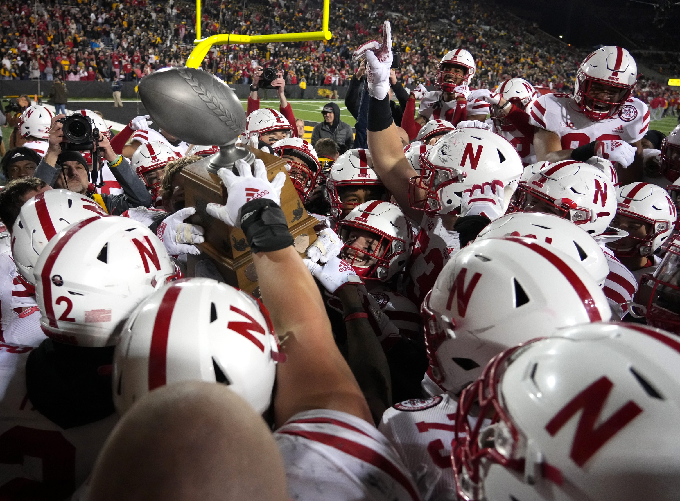 Nebraska Football's Exciting Night Showdown vs. Iowa Heroes Trophy