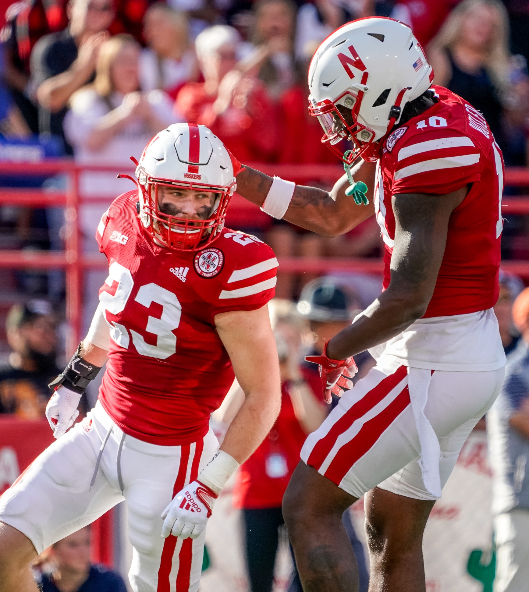 Two Huskers football players added to basketball roster